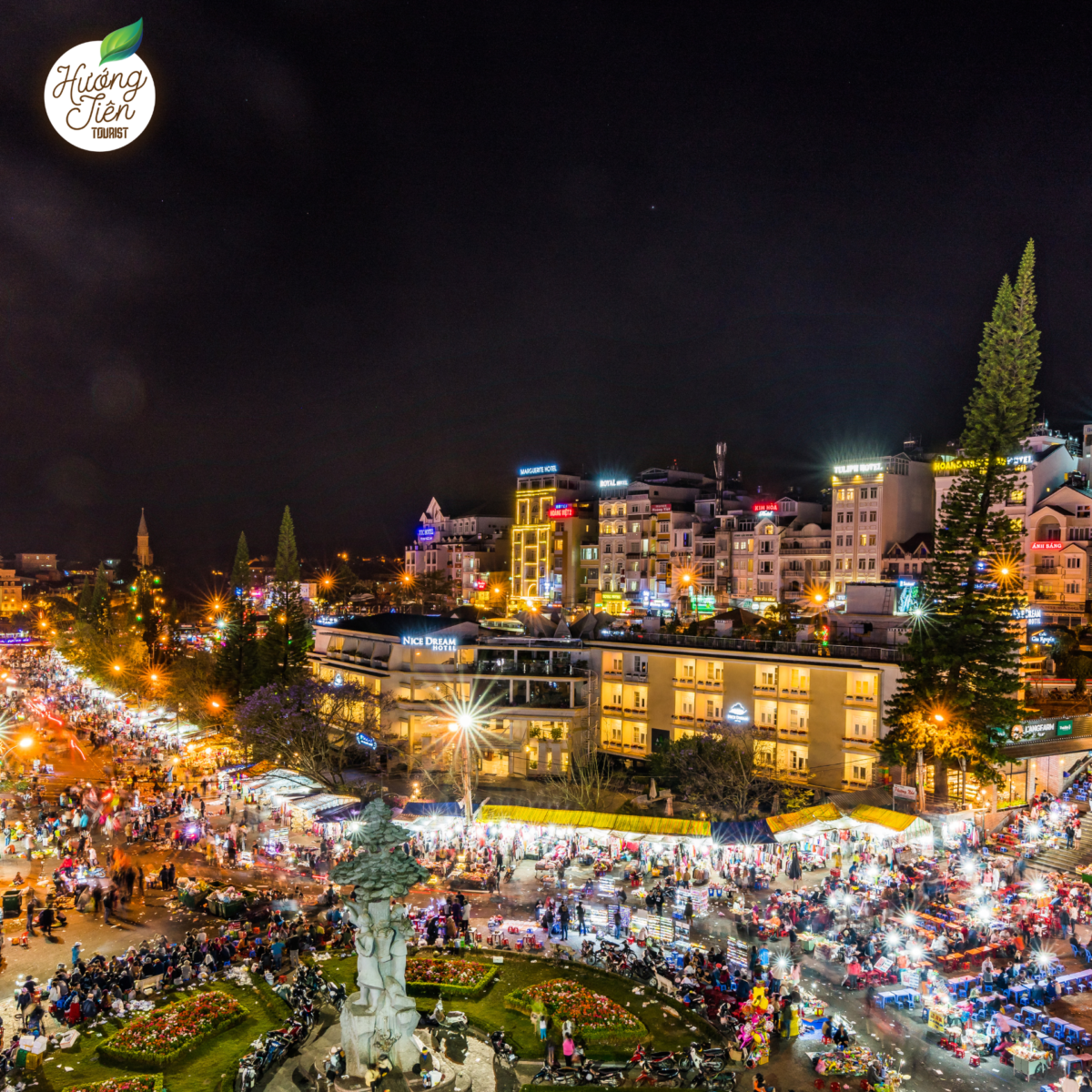 Dalat Night Market bustling with activity at night on the Da Lat Land Tour, offering a vibrant local experience.