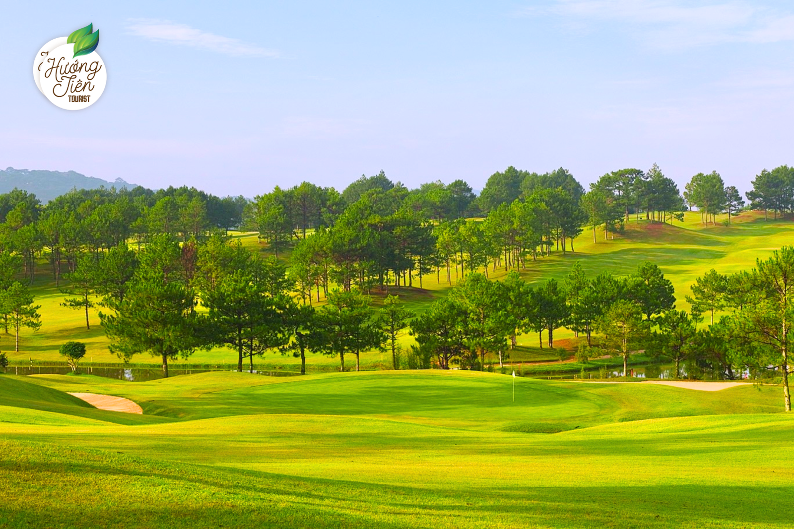 Dalat Palace Golf Club featuring rolling green hills and pine forests in Da Lat, Vietnam