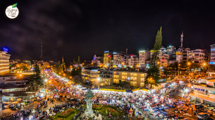 Dalat Night Market bustling with activity at night on the Da Lat Land Tour, offering a vibrant local experience.