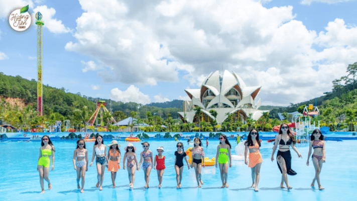 Visitors enjoying the water park at Dalat tourist attraction as part of the Dalat Land Tour with Huong Tien Tourist.