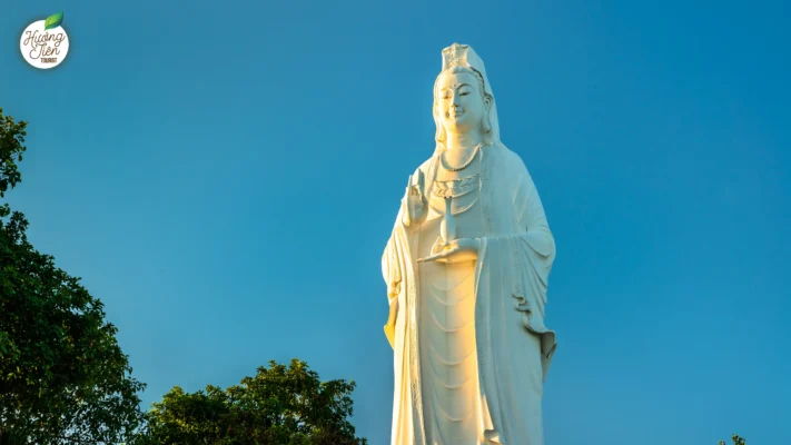 Tall white Goddess of Mercy statue on Son Tra Peninsula in Da Nang, a revered spiritual landmark in Central Vietnam.