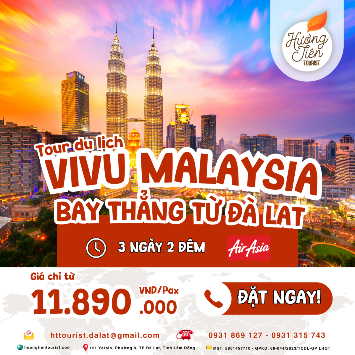 banner tour malaysia khởi hành từ đà lạt hành trình 3 ngày 2 đêm với dòng chữ "Vi vu malaysia" màu đỏ viền trắng. Hình nền tháp đôi petronas buổi tối lên đèn